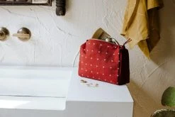 Anchal Accessories Cross Stitch Toiletry Bag - Rust